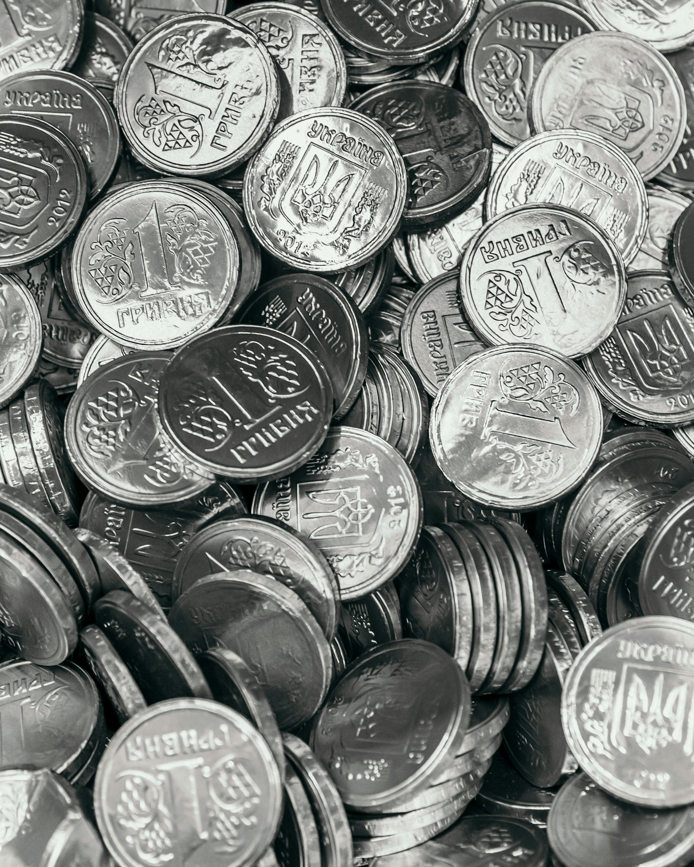 An unsorted lot of silver-colored coins